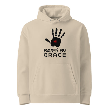 Sandfarbender Unisex Hoodie aus 100% Bio-Baumwolle mit schwarzem Handabdruck, rotem Wundmal-Detail in der Handfläche und dem Schriftzug 'SAVED BY GRACE' – nachhaltige christliche Mode & Streetwear.